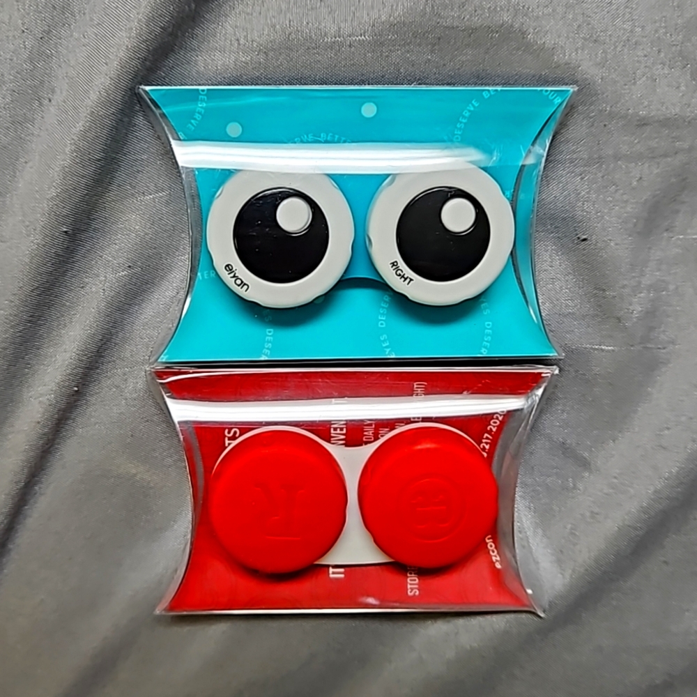 Two NEW contact lens cases